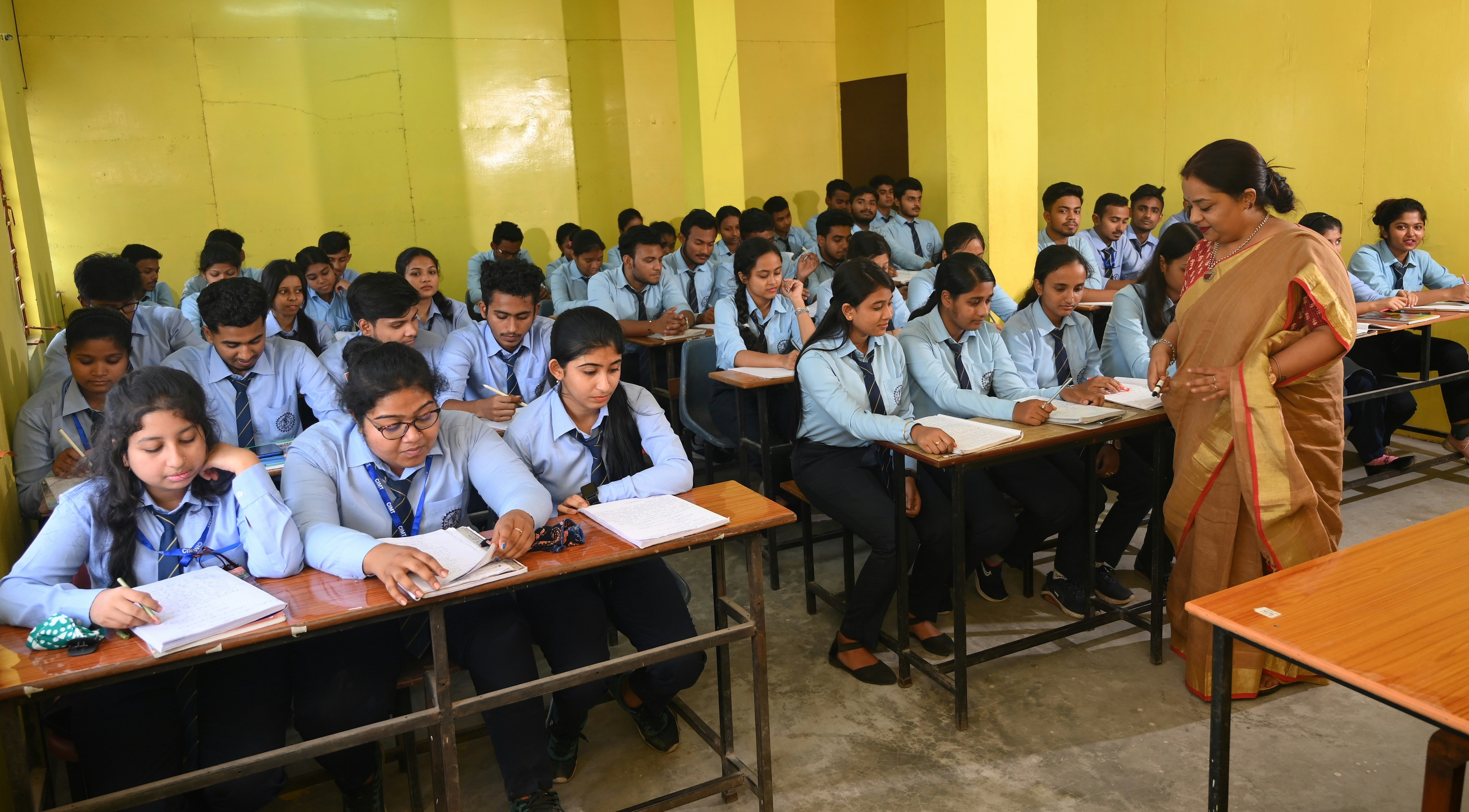 Teacher with students